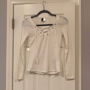 Long sleeved tie up neck shirt